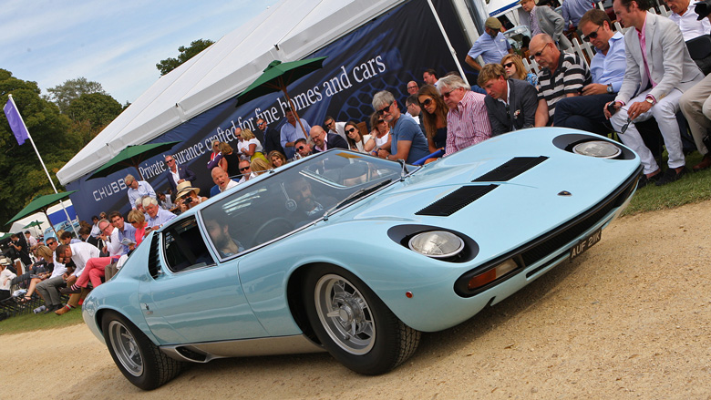 Once owned by Tony Iommi of the Rock Group Black Sabbath, this late model split sump Miura SV chassis 4814 is the only right hand drive example of only two finished in Azzuro Cielo. For a brief period during the 1980s this car was owned by my boss at the dealer I worked for at the time. It took them a year to sell the car and whilst driving it to its new owner the car caught fire. It was whilst passing the Little Chef roadside restaurant on the old A23 just north of Brighton that my boss noticed the flames in the engine bay. I can just imagine the diners in the restaurant that day, enjoying their full English breakfasts knives and forks in mid-air, when into the car park roars a blue Lamborghini Miura with flames licking out of the engine bay. Suddenly a 6ft 4in somewhat rotund and sweaty motor trader crashing through the front door of the restaurant to grab the conveniently located fire extinguisher behind the till before rushing back outside to put the flames out. The car was delivered to its new owner a week later, by trailer. A pal of mine still has two of the somewhat scorched air filter nuts in his tool box, the third having melted away entirely.
