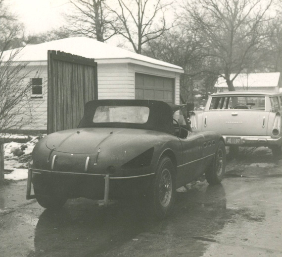 That's an Austin-Healey windshield holding up that top.